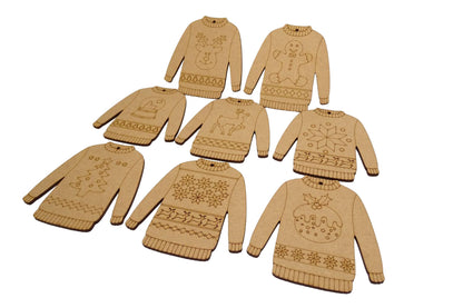 Set of 8 MDF Christmas sweaters with various etched Christmas designs on a white background