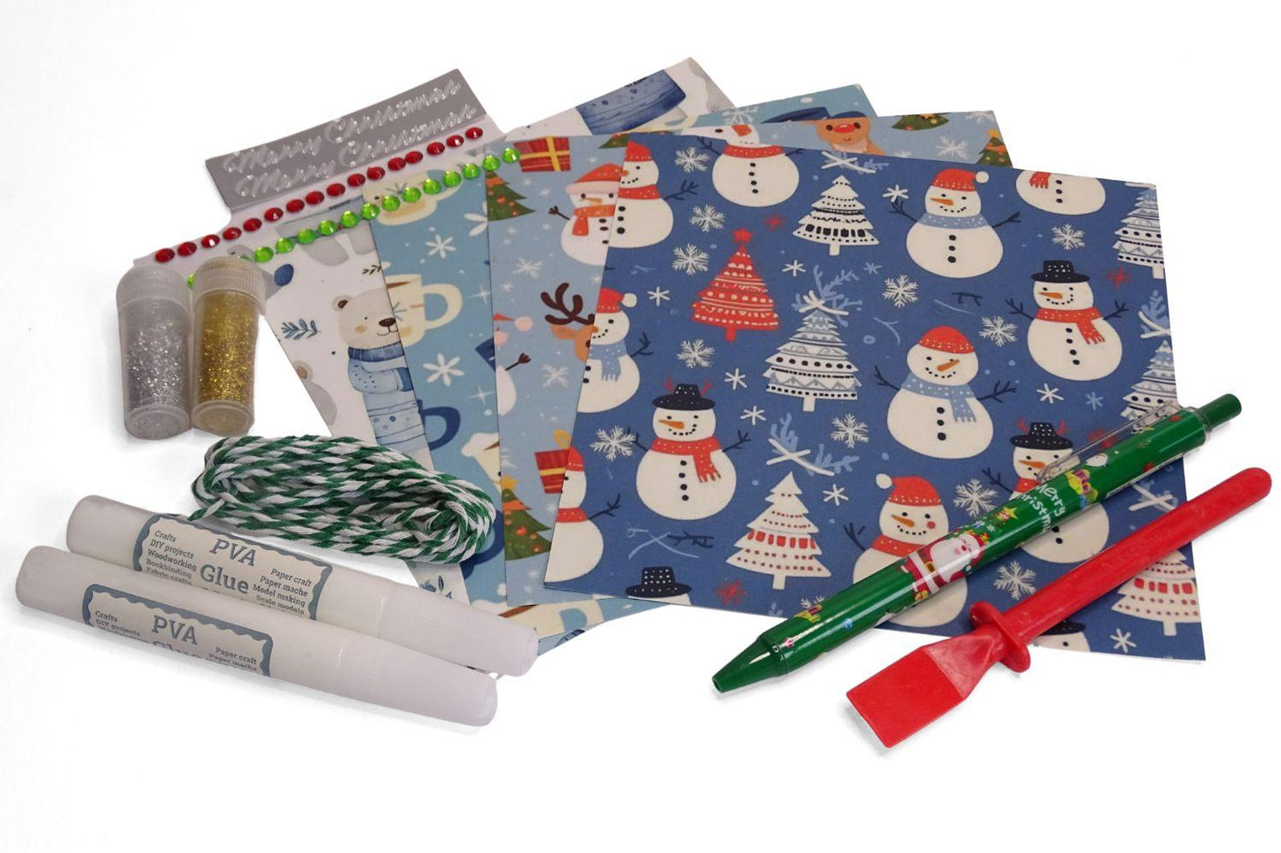 Some craft items for making your own tags. Including Christmas paper, twine, Glitter, sparkles and glue. 