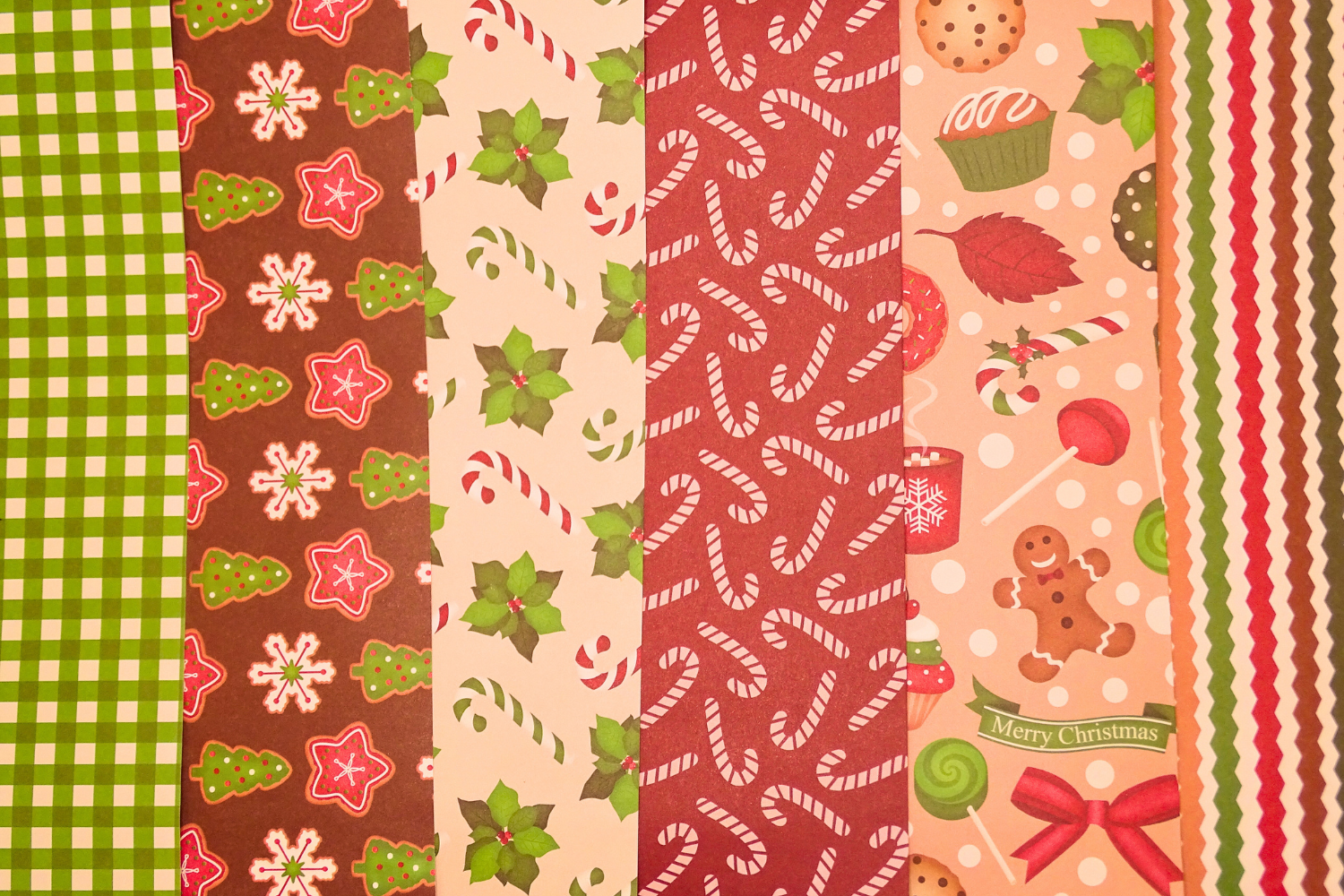 selection of 6 different Christmas themed papers.