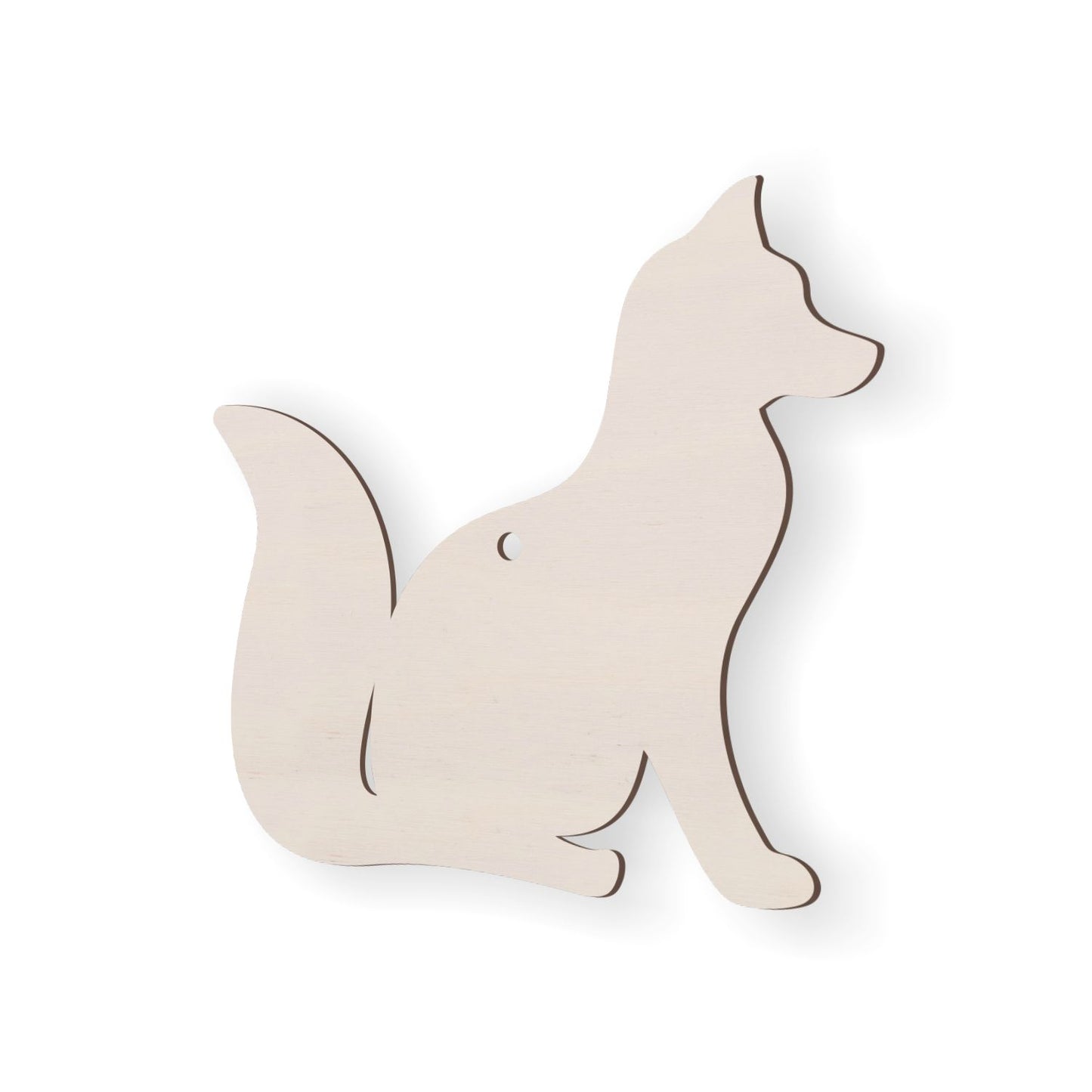 Wooden fox-shaped cutout on a white background