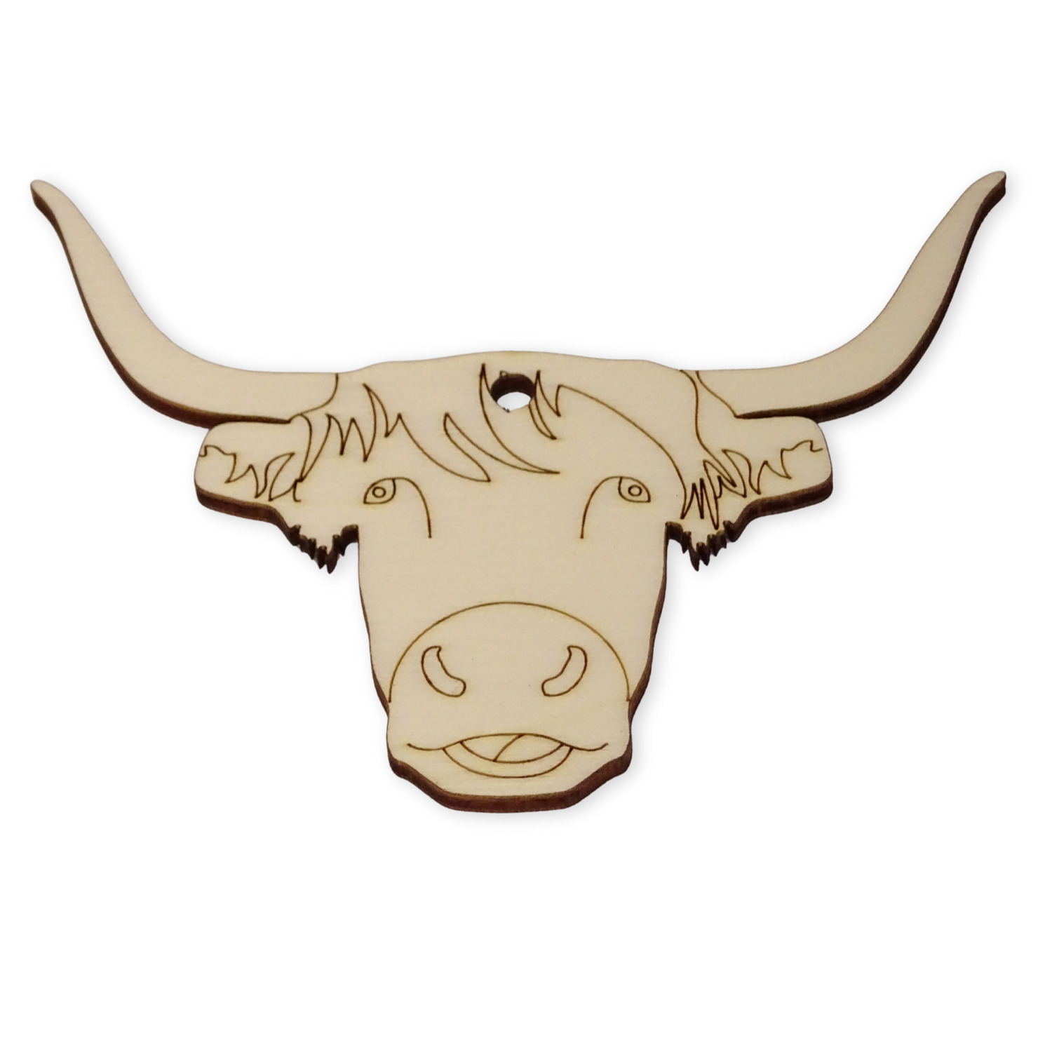 A highland cow shaped wooden craft shape on a white background. Showing the hole position and the laser etched face details on the surface of the wood.