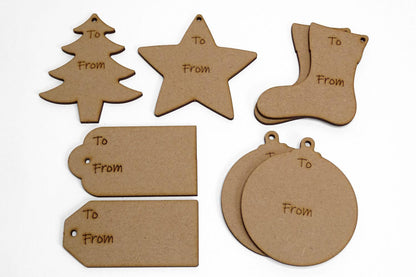 Set of eight different present tags made from MDF with "To and From" etched onto the the surface.