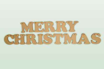 MDF "Merry Christmas" letters laid out on a green background showing the font style and bunting holes