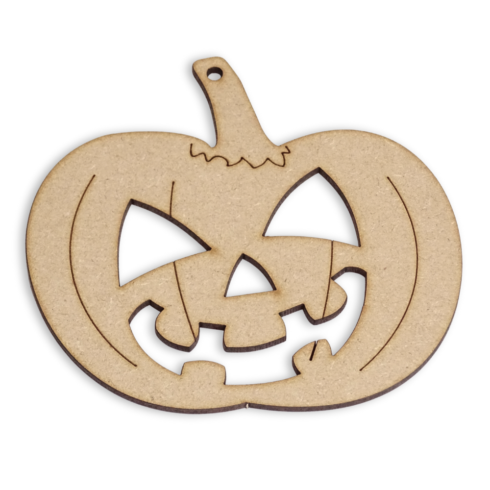 MDF pumkin shape on a white background with a cut-out face and etched details