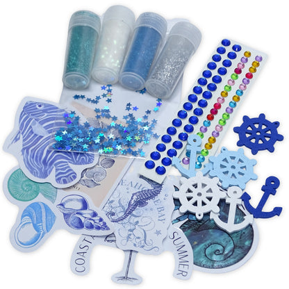 Collection of decorative items including glitter, beads, and nautical-themed stickers on a white background.