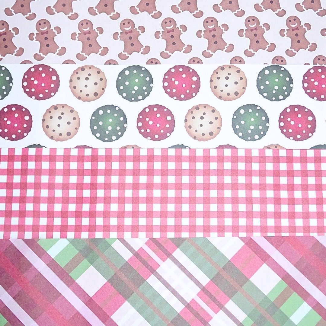 image of 4 different designs of festive paper included in the kit.
