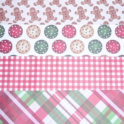 image of 4 different designs of festive paper included in the kit.