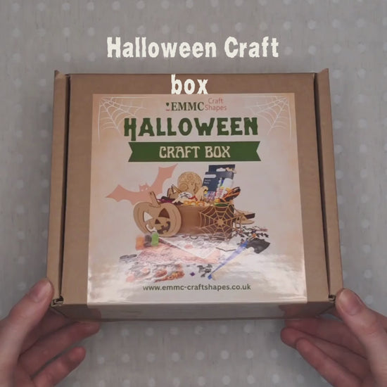 Video of somebody un-boxing  the contents of the Halloween craft box ad shoing the items.
